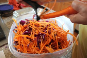 using a julianne peeler, just add thin slices of carrots to your bowl